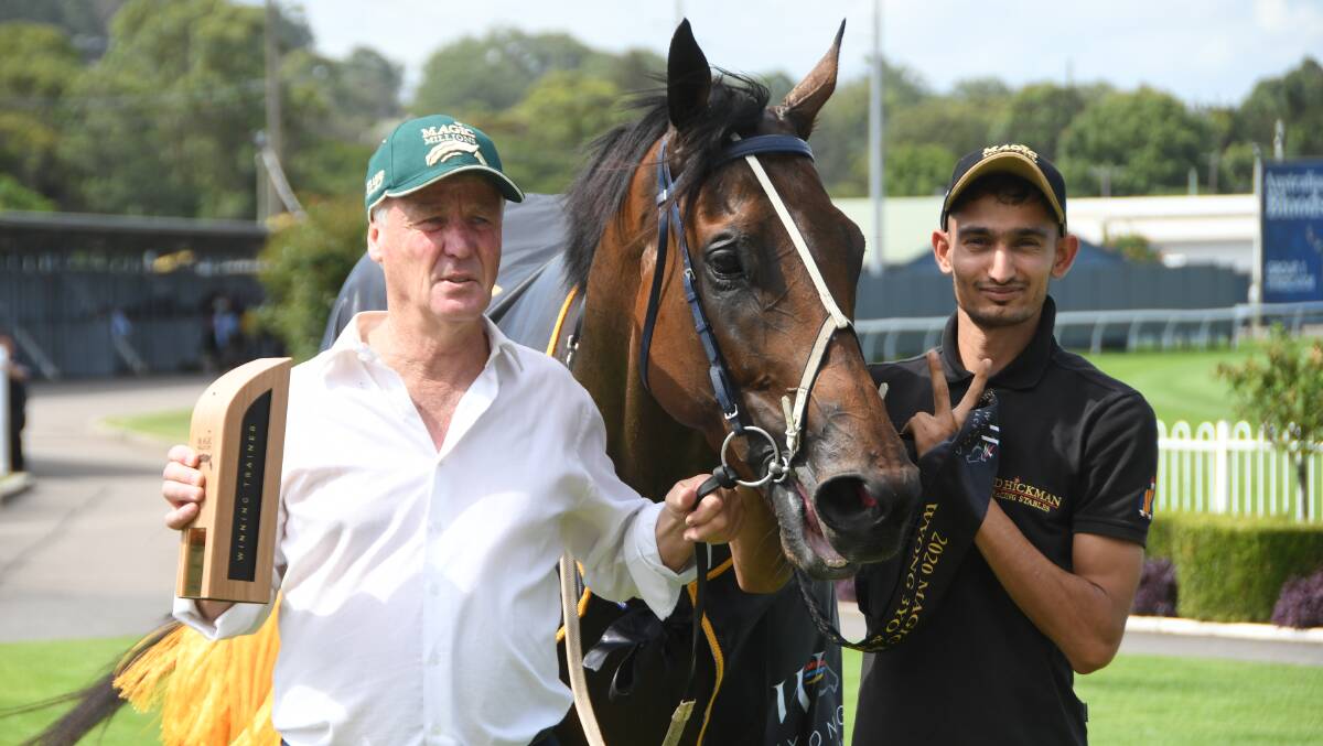 Warwick Farm trainer Greg Hickman with Eleven Eleven and strapper Rahoul Singh after winning the Wyong Magic Millions Three and Four-Year-Old Stakes. 