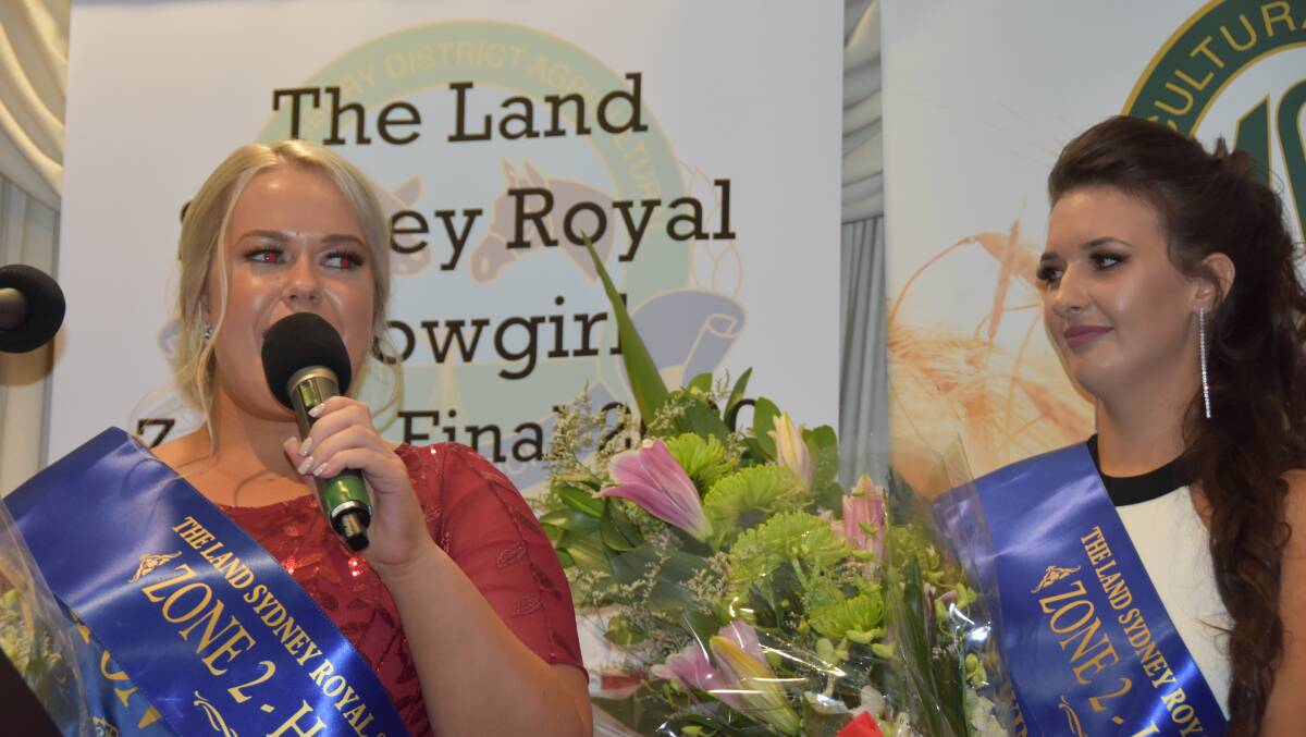 Milton's Emily Quinn and Hawkesbury's Eliza Babazogli after being announced Zone 2 winners in the The Land Sydney Royal Showgirl competition at the gala function at Hawkesbury Race Club.