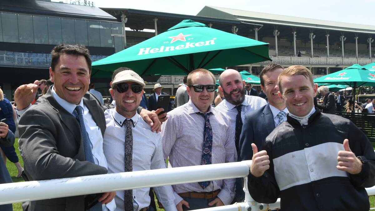  Scone trainer Mark Schmetzer (second from left), some owners of Air Marshal and jockey Tommy Berry after winning the TAB Highway. Photo Virginia Harvey.
