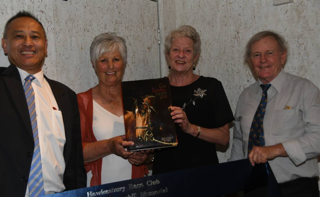 Hawkesbury Race Club chair Phil Chen, with Australian Thoroughbred Breeders Club's Joan Pracey (president), Janita Marscham, and John Horton with Churchill's Great Thoroughbred Sires Of The World. Photo Virginia Harvey