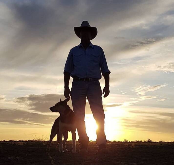 People who have a farmer mate or relative on the land are urged to phone up and give their friend a cheer along this Monday in 'Phone-a-Farmer day' to help boost spirits in the drought. Photo by Pernelle Alexander of her husband Robert and Snoop at Bohena, Narrabri.