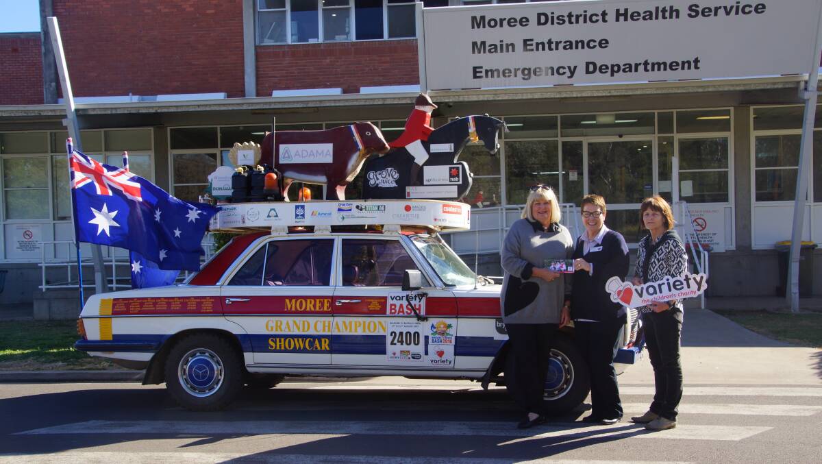 Lee Estens with her Variety bash car with her great mate Barb Glennie, at right, handing over more support to the Moree Health Service in 2017.