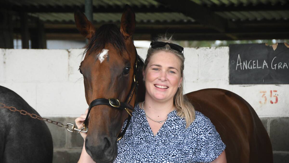  Angela Graham with her first winner as a trainer Whats Onemore. The conditioner recently relocated to Port Macquarie. Photo Virginia Harvey 