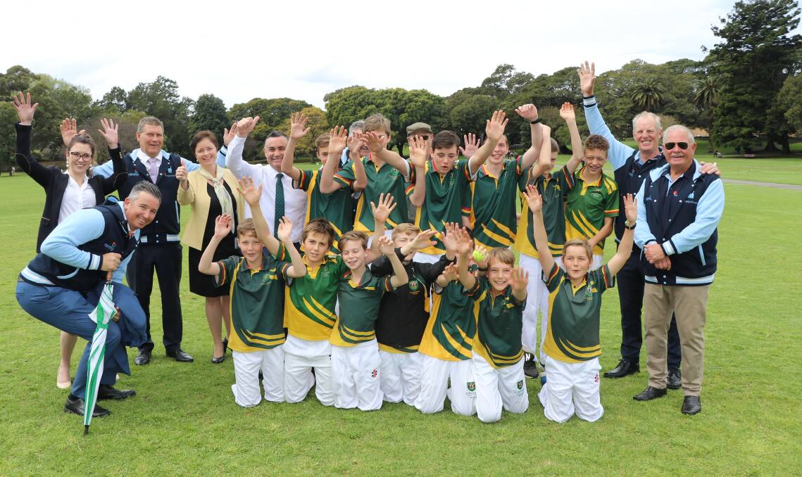 Blues old and new and young cricketers from St Augustine's College launch the special rural cricket tour yesterday.