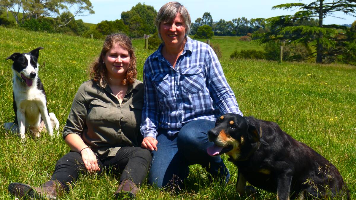 UP IN ARMS: Ellen Kelly and mother Sharon Kelly, Korumburra, with Border Collie Gus and New Zealand Huntaway Tribe, say a proposal to limit the amount of dogs on farm land in South Gippsland is unworkable.