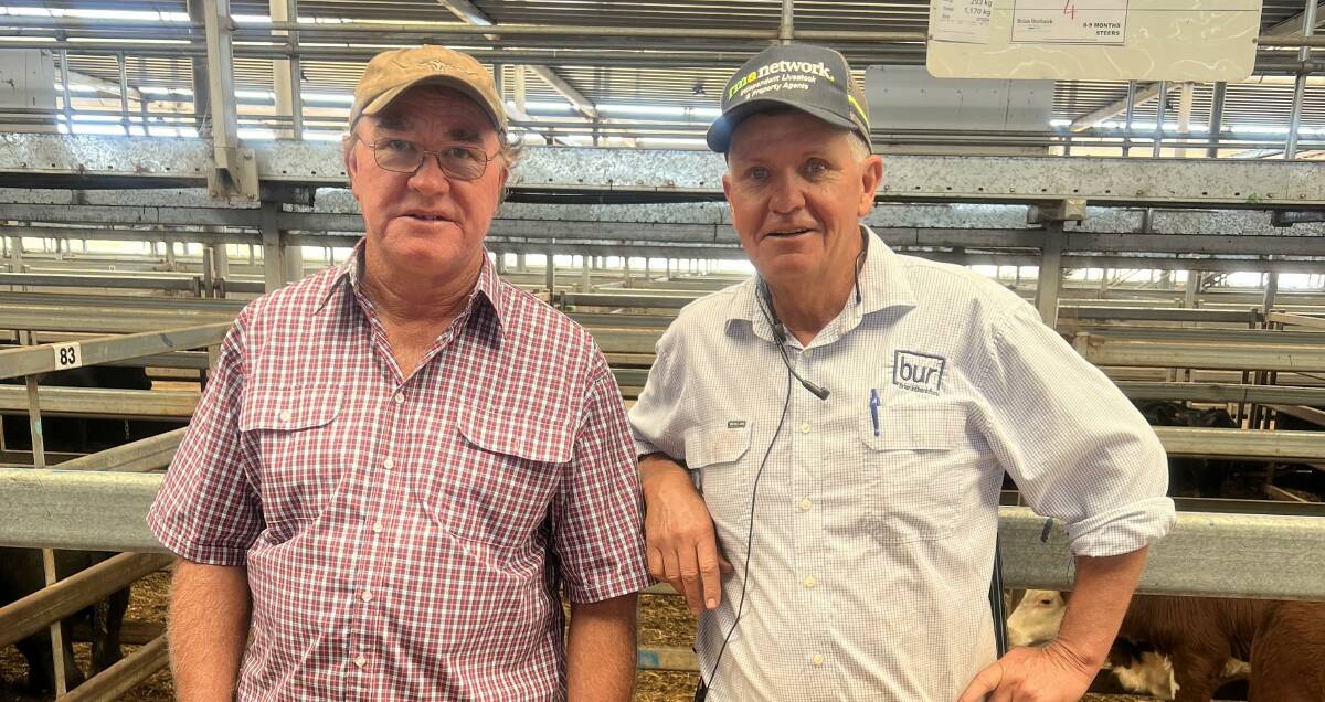 Don Cameron, Bowna, sold 20 Hereford steers, 330kg, for $2250 or 681 cents a kilogram. Pictured with Brian Unthank Rural director Michael Unthank.