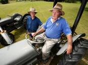 ROLL ON UP: Grey Fergie Tractor Muster Committee members Winston Doak and Ken Brett. Photo: Gareth Gardner