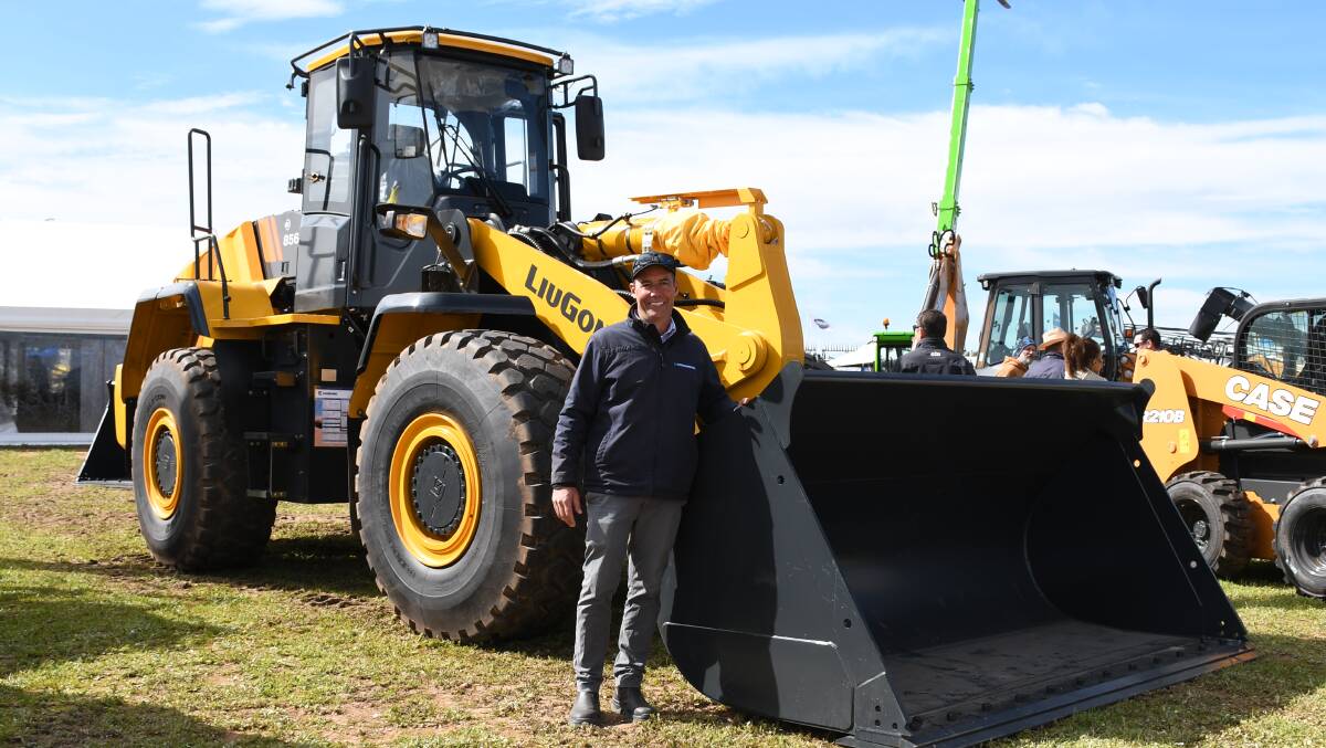 LiuGong distribution manager Johnny Inferrera with the LiuGong 856H wheel loader. 
