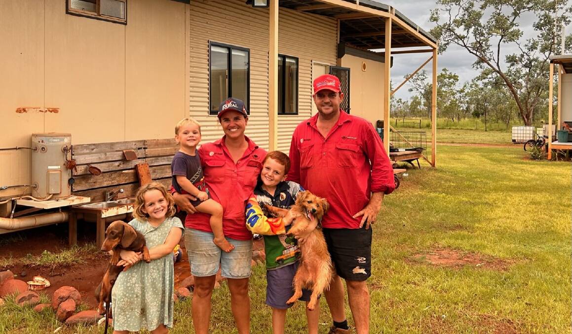 Tori and Sam Burke with their children, Lizzie, 6, Henry, 2, and Billy, 8, connected to Starlink about a month ago at Strangways Station, NT. Picture supplied. 