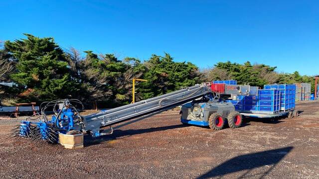 The 2013 JTT conveying 4x4 chicken harvester is located at Bannockburn, Victoria.