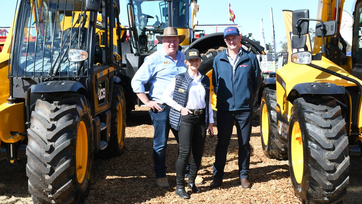 JCB Qld territory manager Dave Moselen, JCB national sales manager for generators Kerry McCauley and Wideland Group general manager Chris Swain at the Aon AgQuip field days at Gunnedah, NSW, last month. 