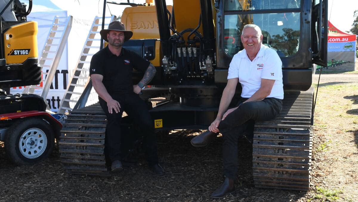 Yello Equipment NSW sales manager Dino Williams and Yello Equipment national operations manager Craig Manuel with the Sany SY135. 