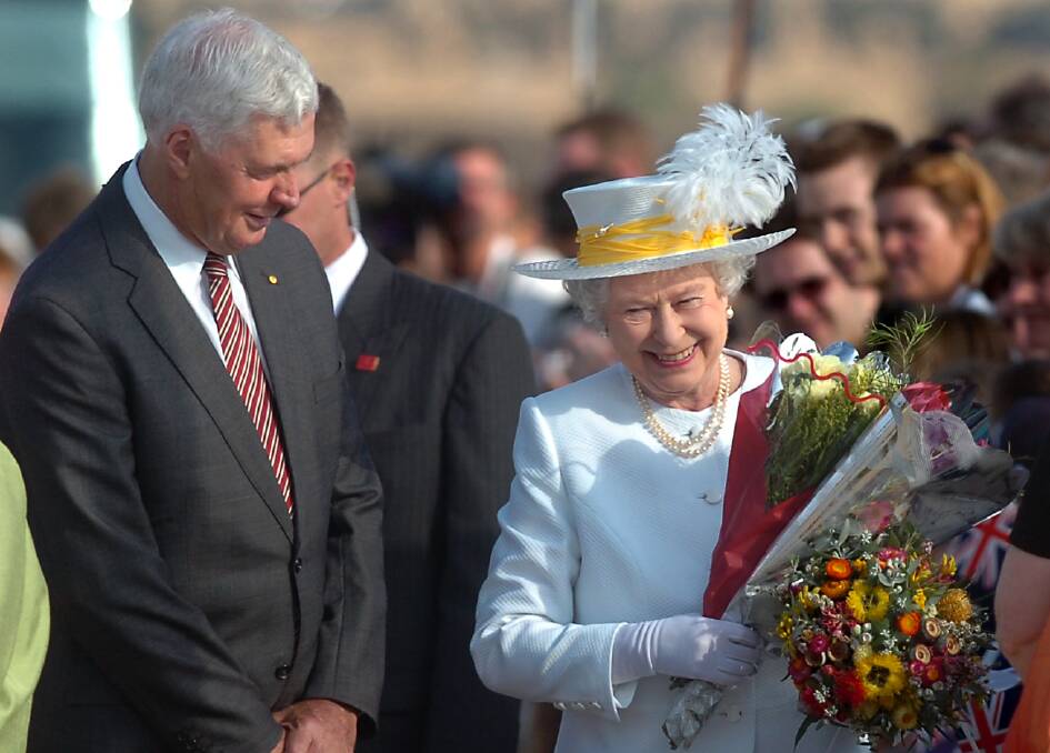 Former governor-general Michael Jeffery in Canberra with Queen Elizabeth in 2006. Photo: Melissa Adams