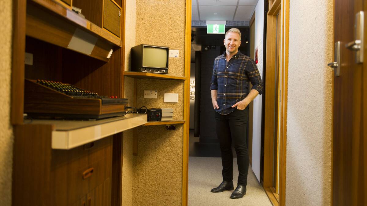 Journalist and incoming QandA host Hamish Macdonald in the "tiny old ABC studios" at Old Parliament house, which have been restored as part of the exhibition. Picture: Dion Georgopoulos