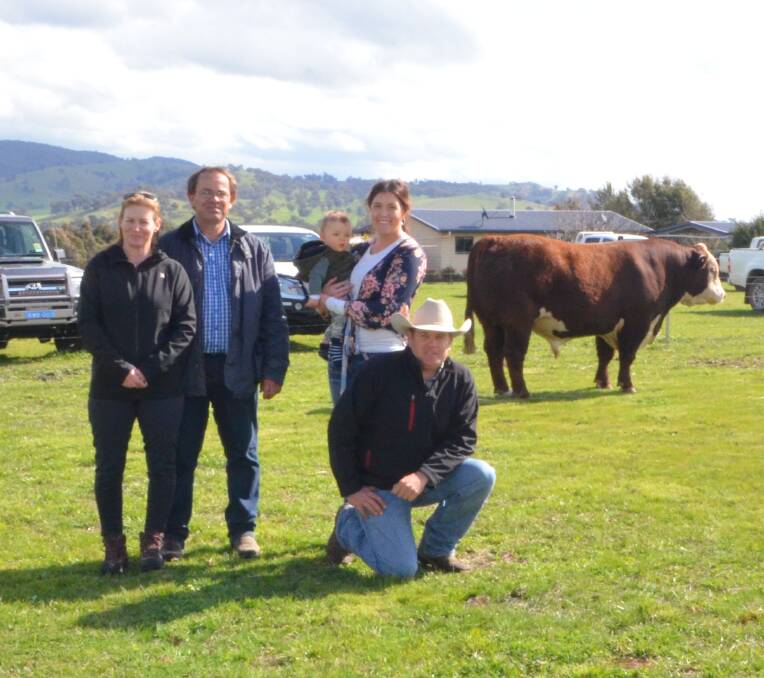 Fiona Coleman and Robert Ward both from Oberon with Belinda, George and James McWilliam, Kanimbla Poll Hereford.