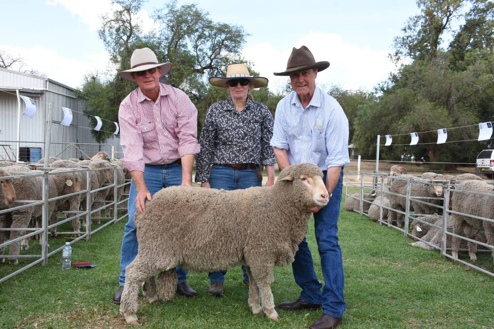 Buyers Dave and Erica Shorter, Burren Juction, stud master Jim Litchfield with top price ram.