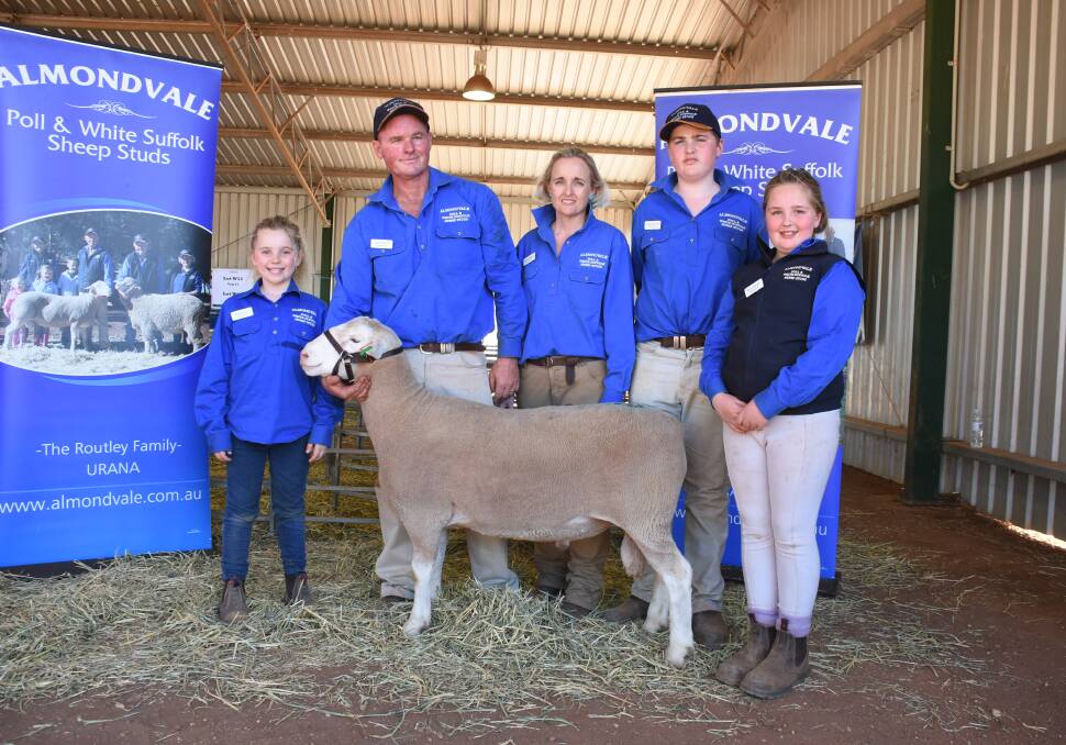 Top price White Suffolk ram pictured with Ruby, Paul, Dallas, Lachlan and Grace Routley
