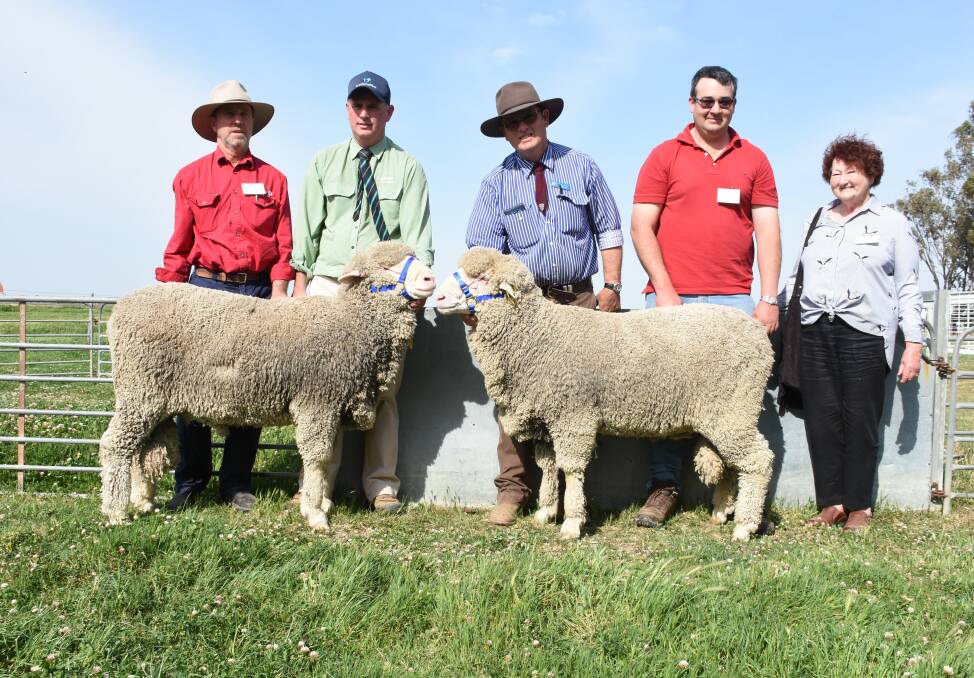 Equal top price rams pictured with purchaser Robert Glenn, Moulamein, Peter Godbolt, Landmark, Vendor Colin McCrabb and purchasers Phillip and Betty Hall, Weethalle.