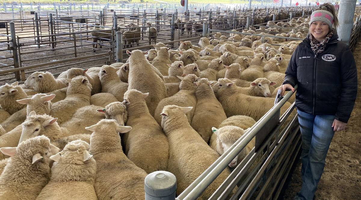 Grace Mooney, Ray White Emms Mooney, with 79 suckers that sold for $168 a head at Carcoar, NSW, last week.