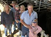 FAMILY: The Ingram family, Bonang, including Esther, Kelvin, Elliott, 3, Wendy, Jamie, Harlan, 9, who sold 134 Angus and Black Baldy steers at Bairnsdale. Both Elliott and Harlan will be seventh-generation Ingram farmers.