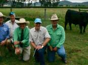 The top-priced bull, Lot 17, with Rodwells Euroa agent Mick Curtis, Alpine stud manager Chris Oswin, Nutrien stud stock agent Peter Godbolt, Alpine owner Jim Delany, and Nutrien agent Dan Ivone.