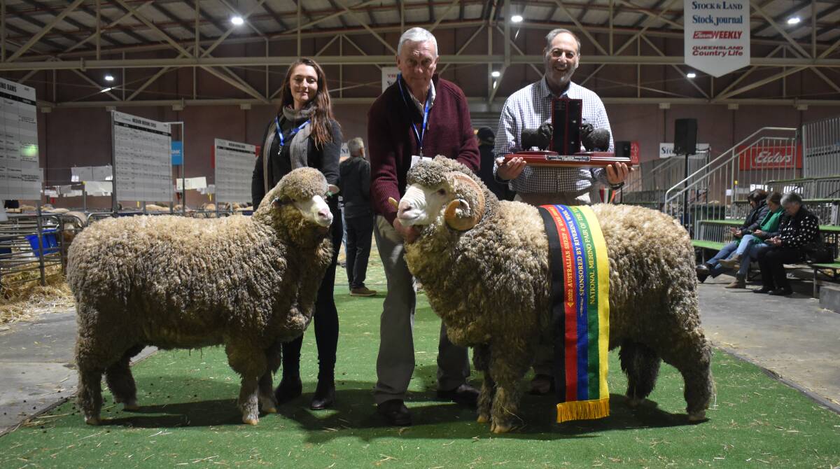 WINNERS: Hollow Mount Merino stud managers Avalon McGrath and David Zouch with owner Ken Wolf, Bigga, NSW, and their National Merino Pair of the Year. 