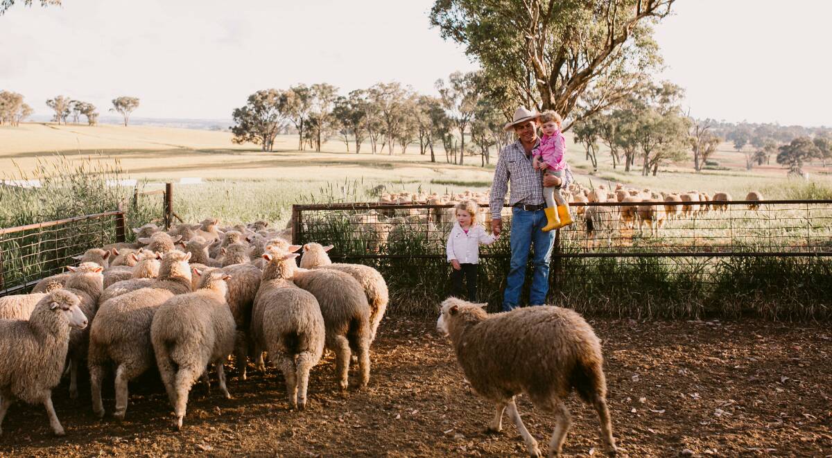 Nick Bailey, with daughters Harriet and Polly, Panuara, NSW, doesn't think a national 'one-size-fits-all' approach to eID tags will work.