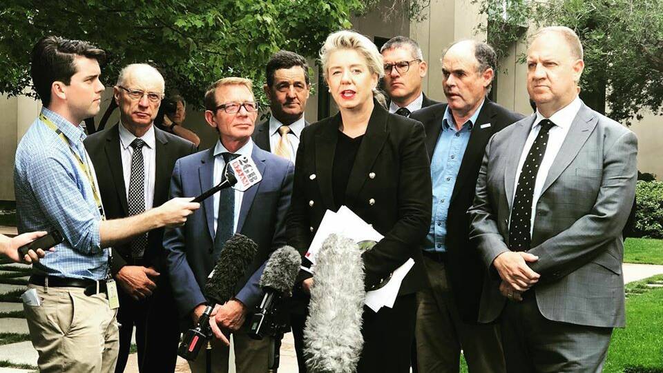 CODE COCKIES: Federal Agriculture Minister Bridget McKenzie releases the mandatory dairy code.