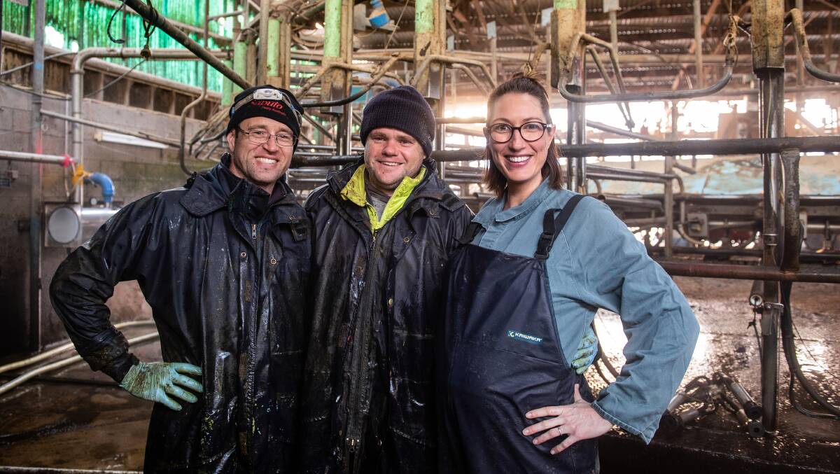 TEAMWORK: James Maxwell, Kerryn Powell and Amber Griffiths in their 50-stand rotary, one of two dairies on the farm they managed with the help of friends and staff members following the tragedy. PHOTO: Coralee Askew