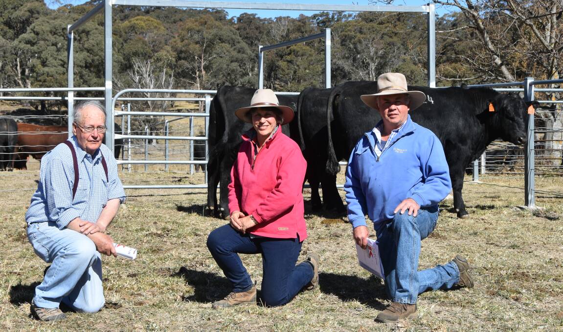 Kilburnie stud principal David Murray with top price buyer and bulk buyer of the day Joanne Gowen, Barrakee, Uralla and agent Tony Fizell, PR watts and co, Armidale 