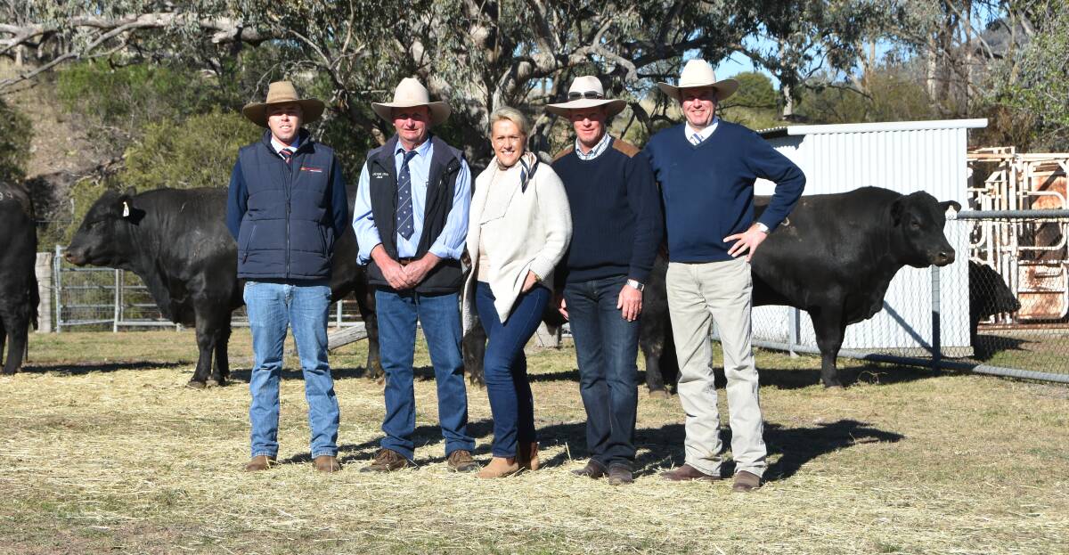 Scott Newberry, Davidson Cameron and co, Tamworth, Jack Smith Cascade stud manager with Belinda and Philip Tongue, Llanillo, Nundle, who purchased 3 lots including the second top price Angus bull and Paul Dooley auctioneer. 