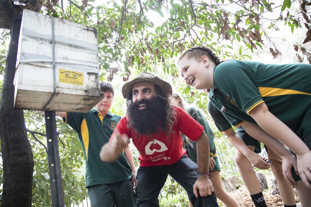 BEE AIRB'B: Camdenville Public School, Sydney, students show Costa Georgiadis their bee hotel.