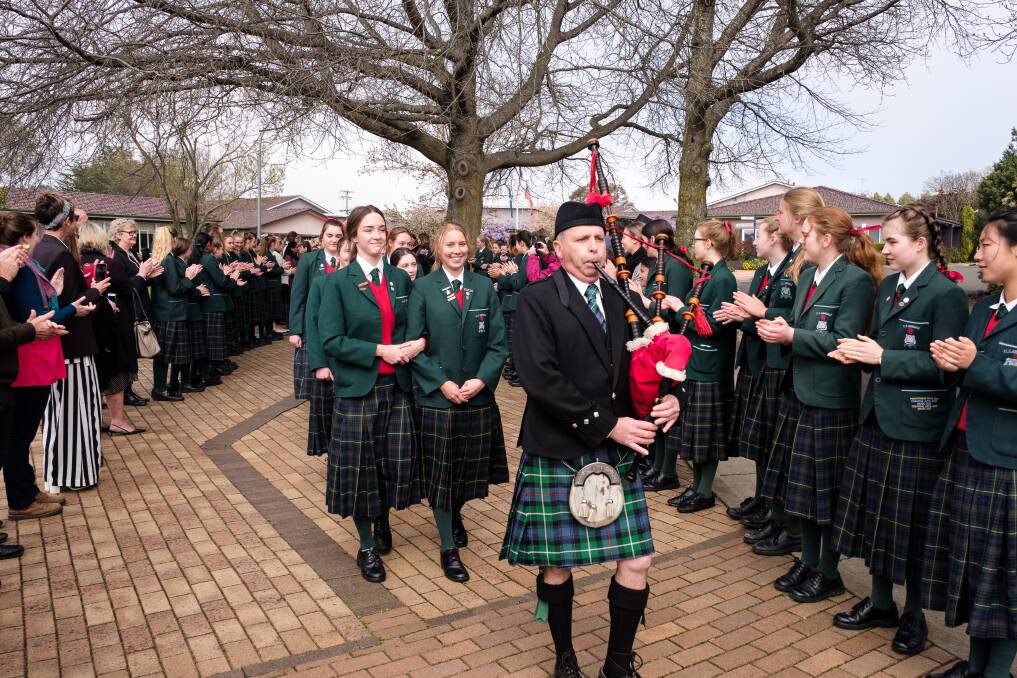 The tradition continues at PLC Armidale, with the 2018 Year 12 students featured doing their walk to graduation through the 'avenue of applause' on Valedictory Day.