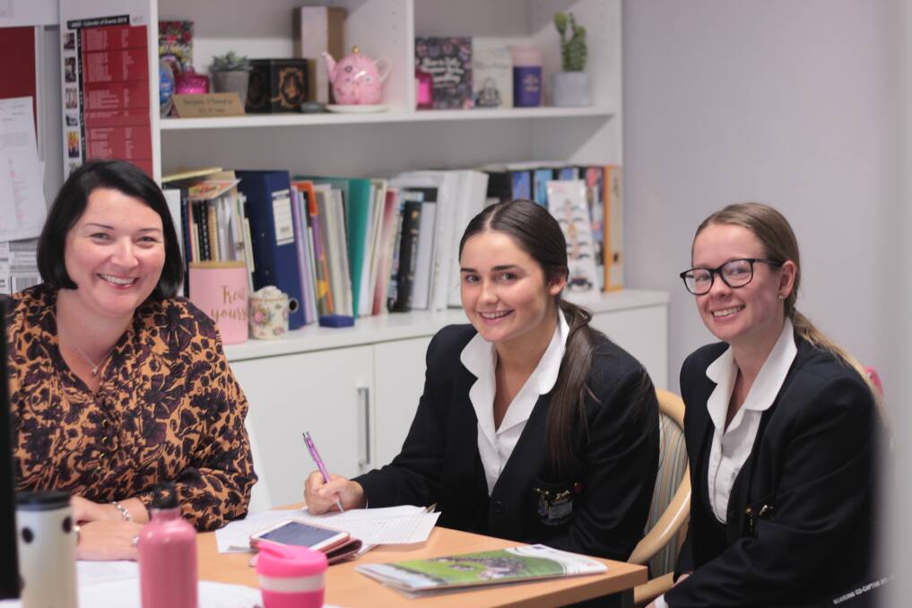 CELEBRATING: The director of boarding Maryanne O’Donoghue and boarding captains Matilda, from Griffith, and Alyssa, from Bourke.