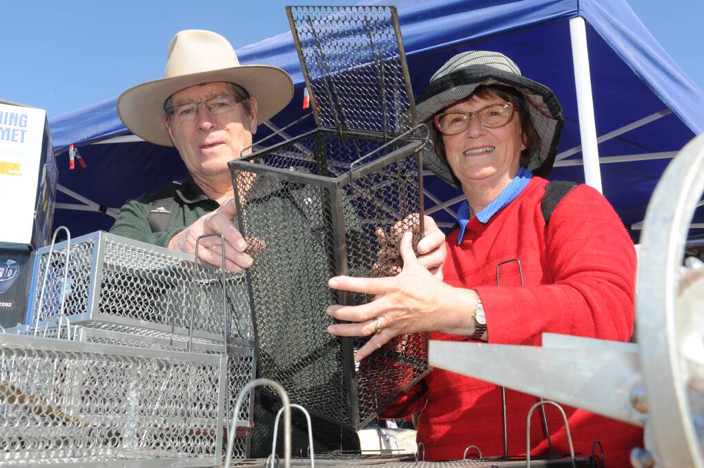 John and Judy Howells, Wanganui, NZ, shop for rat traps.