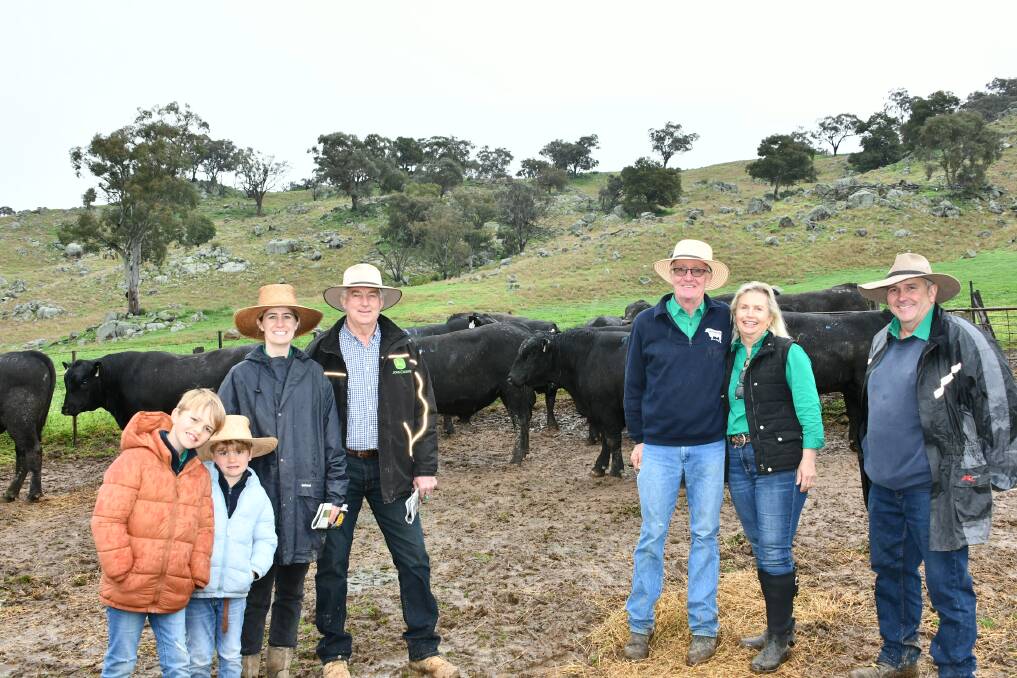 Georgia Graham, Coolac, with nephews Jax and Ted Murphy, Orange, volume buyers Stephen Simpson and his manager Grant McMullen and Bongongo Angus principals Bill and Shauna Graham, Coolac.