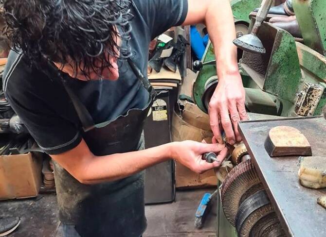 IN THE BLOOD: Cobbler John Saad at work at Coombs Shoe Service. Picture: Supplied