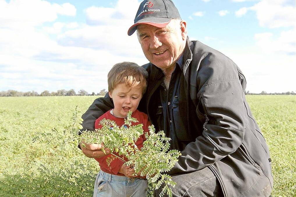Geoff Chase, “Waitara”, Trangie, with his grandson Fergus, 3, sowed 430 hectares to HatTrick chickpeas.