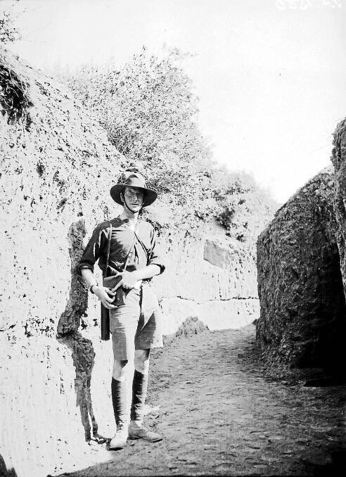 Keen bean: C.E.W. Bean in a large communications trench leading to New Zealand headquarters. Photograph by Phillip Schuller. AWM PS 1580.