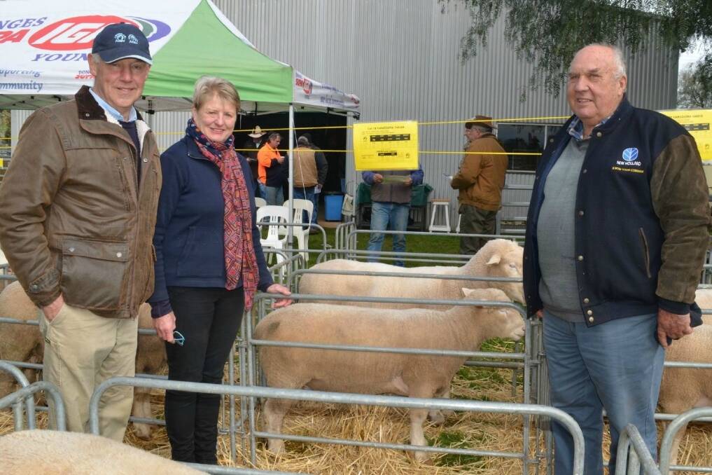 Paul and Kate Sevier, Yangoora Gromark Genetics with Malcolm Wooden "Kurrambee" Junee with the equal top-priced ram he purchased for $700