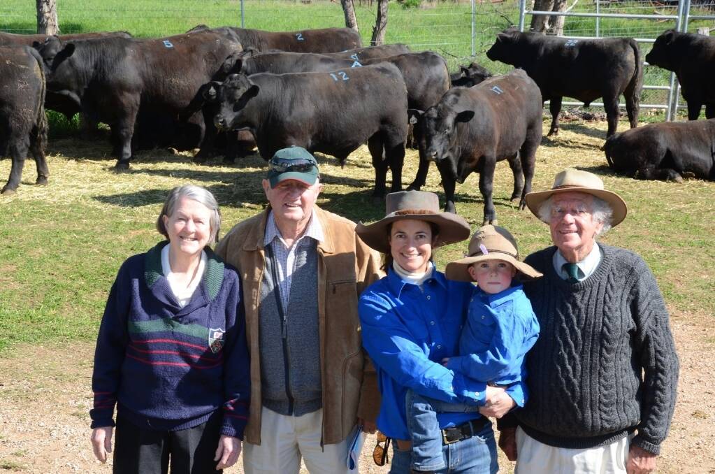 Buyers of the $6500 equal top-priced bull Heather and John O’Donnell, “Merriwee”, Condobolin, are pictured with stud principal, Netta Holmes Lee with three-year-old son, Harry, and her father, Keith, Dorrigo, after the 25th annual Noonee Angus production sale at Larras Lee.