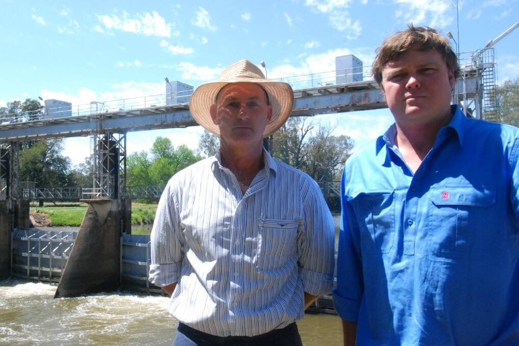 Jemalong Irrigation chairman Stuart French, Corinella, and Lachlan Valley Water chairman Tom Green, Forbes, at the Jemalong Weir, near Forbes.