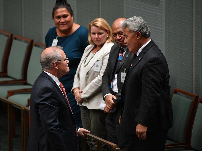 PM Scott Morrison (L) will face pressure on climate change at the Pacific Island Forum next week.