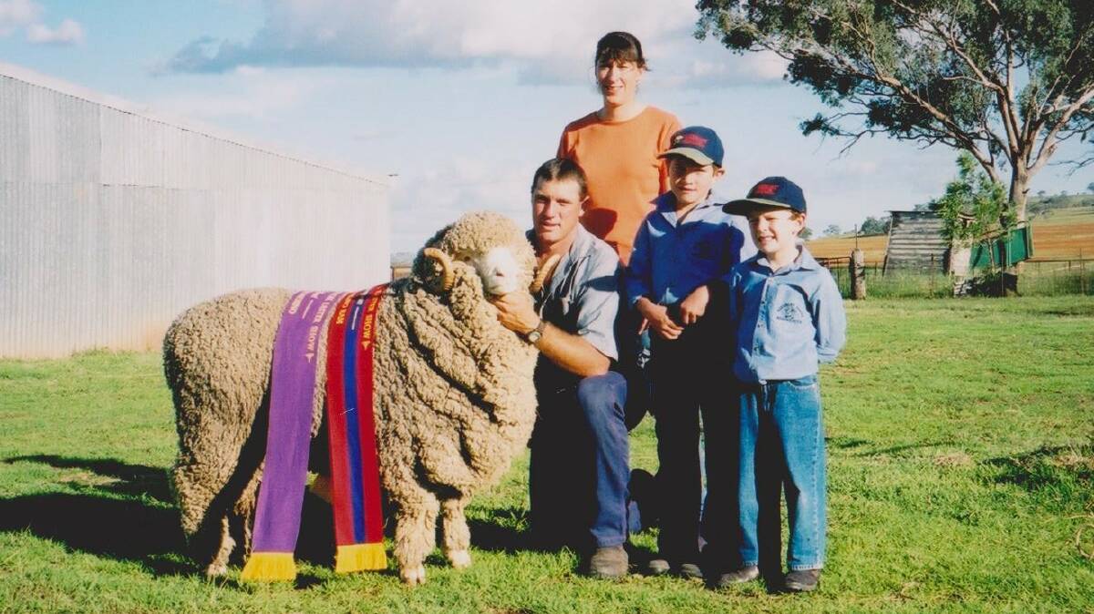 Sean, Judith, James and Sam Ballinger in 2003 with Sydney Royal junior Merino ram.