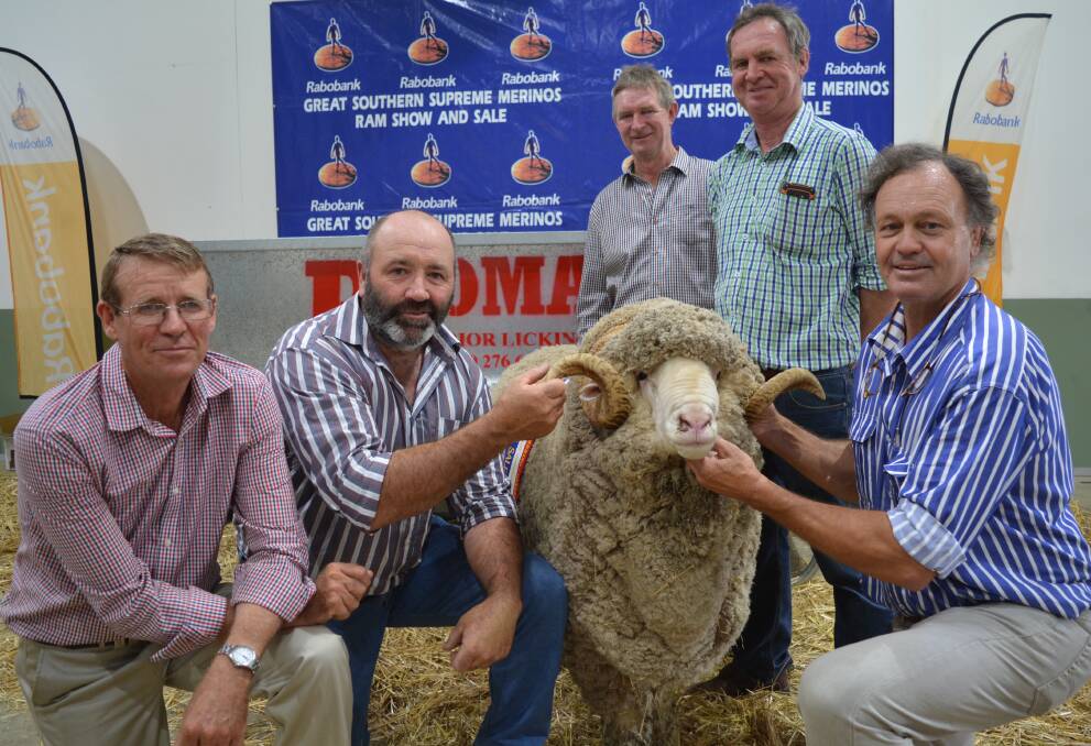 Syndicate members Malcolm Cox, Bocoble stud, Mudgee, Peter Lette, Conrayn, Berridale, Patrick and Andrew Davis, Demondrille, Harden, and George Merriman, Merryville stud, Boorowa, with the $21,000 Merino ram at the 2017 show.