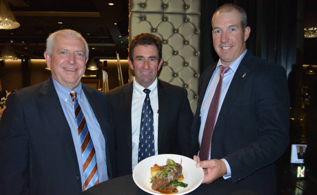 PREMIUM: Tony Haggarty, director, Herefords Australia, Stephen Moy, livestock manager, NH Foods, and Andrew Donoghue, general manager, Herefords Australia, with Hereford Reserve beef.