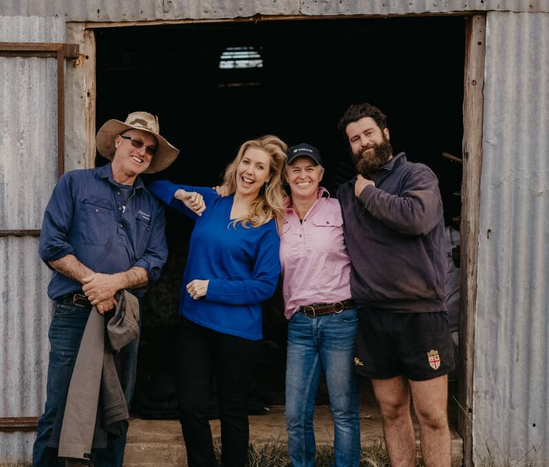 BACK TO THE SOURCE: Aloeburn Poll Merino stud's Andrew, Jodie and Tom Green with Catriona Rowntree, who is wearing one of the wool Blue Illusion jumpers made from Aloeburn's wool. Photos courtesy of Blue Illusion.
