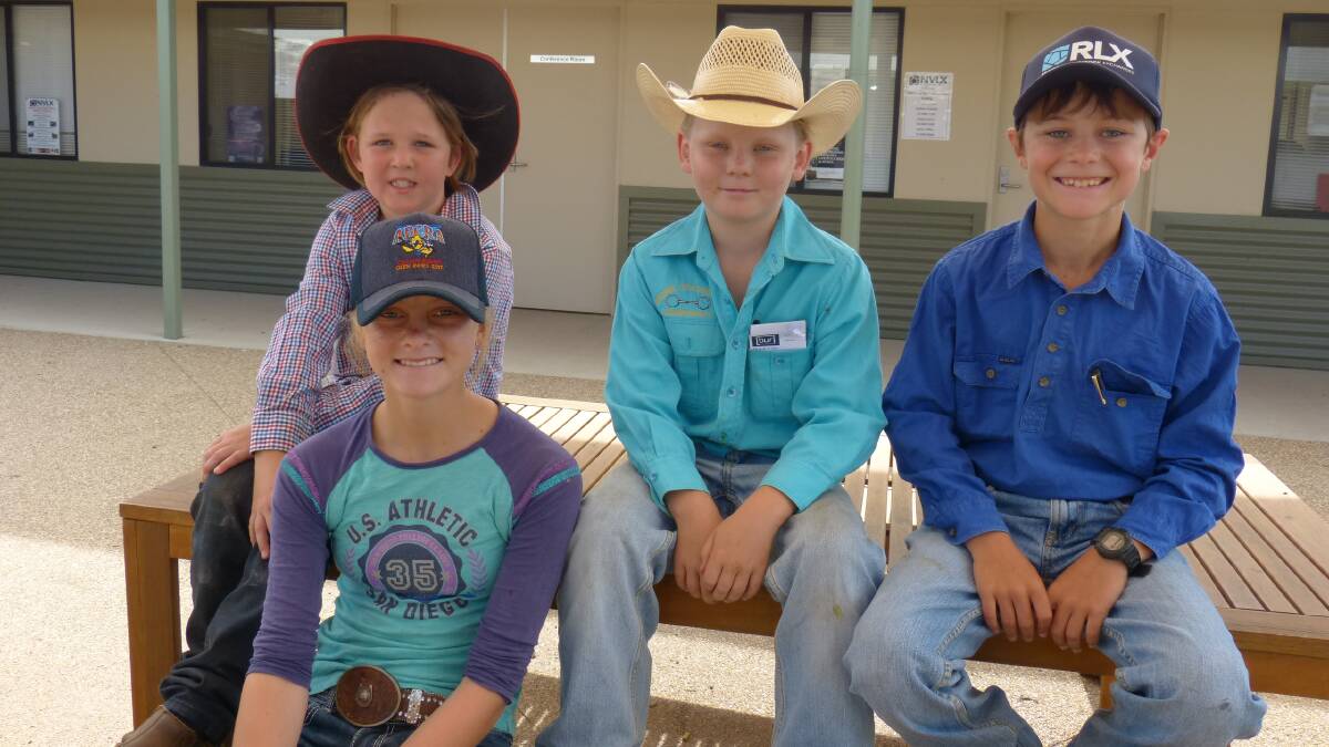 Helping out their dads at the Barnawartha saleyard,was Riley Shannahan, and brother Paddy, right, Harry Hiscock, centre, and Kye Theile.