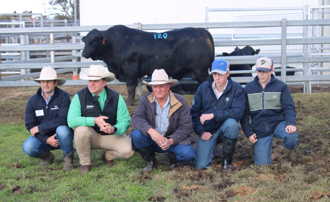 Palgrove Ribeye sold for $74,000 and is with Ben Noller, Colby Ede, Nutrien, and the buyers Adrian Forrest and his sons Will and Jake.