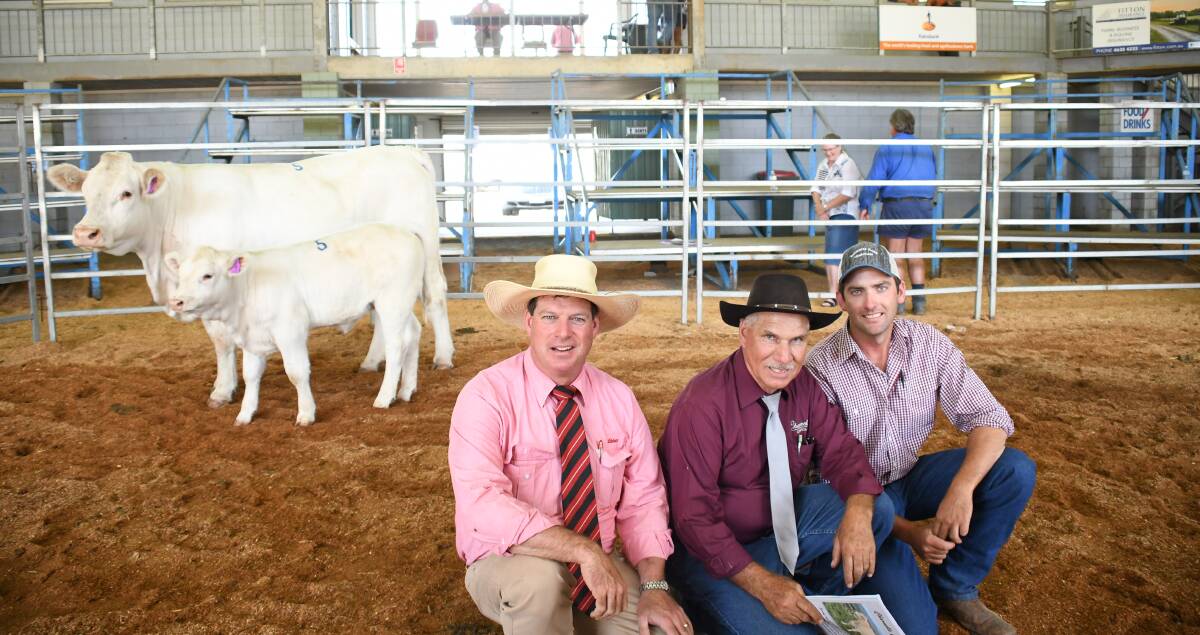 Selling agent Michael Smith, sale coordinator Graham Blanch and vendor Ryan Holzwart, Bauhinia Park, Emerald, with the top price female, Bauhinia Park Natalie 15 (AI), sold for $8500.